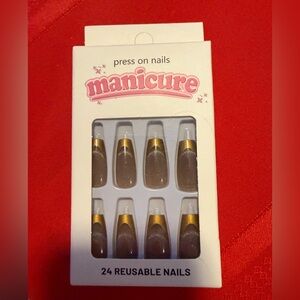 Manicure Gold tip long press on nails with shimmer nude base